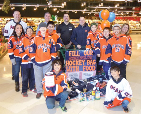 Seafair Minor Hockey kids are on a mission to collect food for the Richmond Food Bank. Dec. 2014.