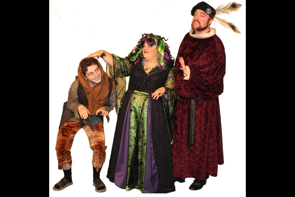 Igor (Michael Wildman) gets a dose of faint praise from evil fairy Deadly Nightshade (Kerri Norris), while Hogweed (Mark Manning) looks on. They're part of the fun in the Sleeping Beauty pantomime.