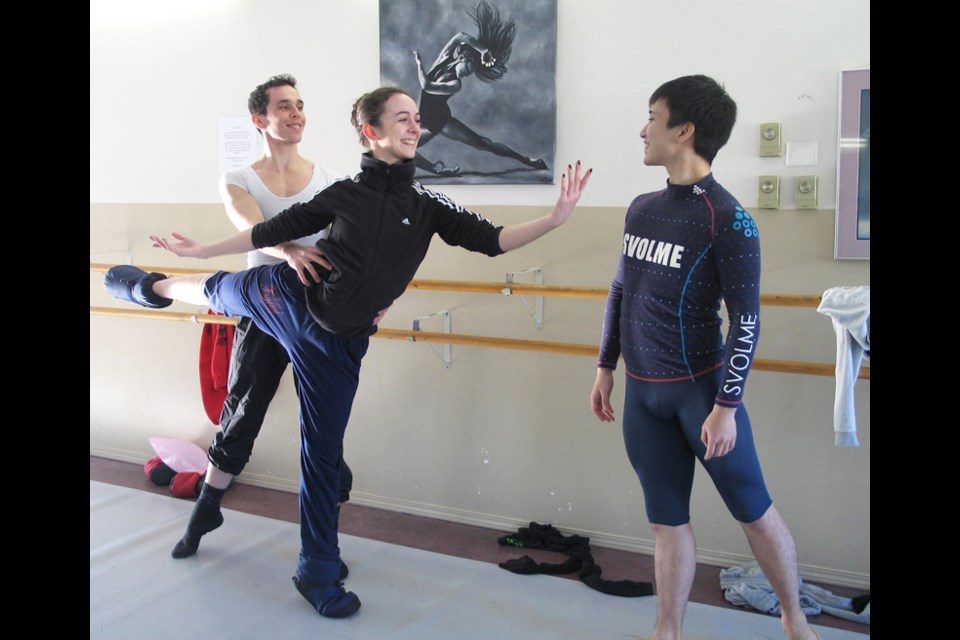 Rehearsal zone: Guest dancer Diego Ramalho leads Ana Paula Oioli in a graceful move for their parts as Snow King and Snow Queen while dancer Yuta Kawakami looks on.