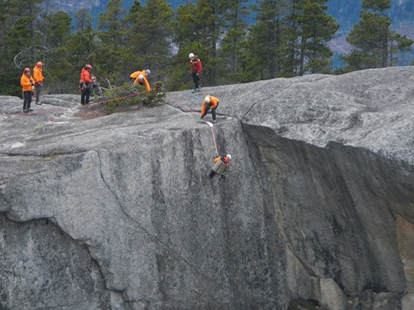 Squamish Search and Rescue workers rescue a man cliffside on the third peak of The Stawamus Chief.