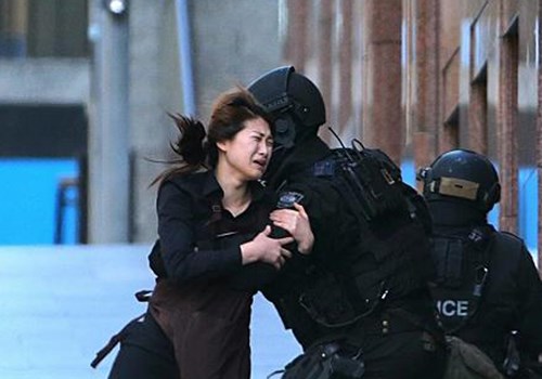hostage runs to police