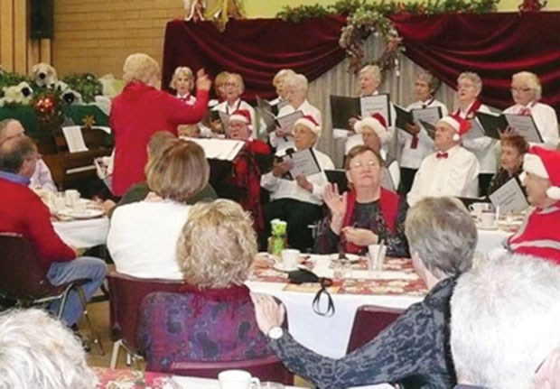 The ElderCollege Delta Singers led by Pat Rogers performed for an appreciative audience made up of Delta Stroke Recovery members and guests during their Christmas celebration last week at the Tsawwassen United Church. In addition to the ECD Singers leading the Christmas Carol singalong a punch was served to those participating in the games portion of the event before lunch and a humorous game led by member, Duncan Holmes.