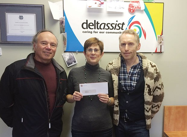 Frank Rogers (left) and Patrick Thompson presented Deltassist senior services coordinator Lyn Walker with a donation from the Port Community Liaison Committee.