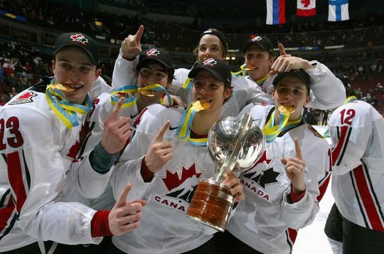 The Canadian national under-20 hockey team pose with their gold medals after winning the 2006 IIHF World Junior Championship in Vancouver. Hockey Canada photo
