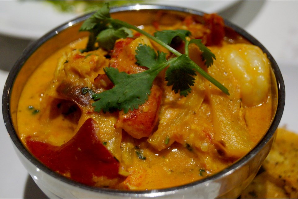 Portuguese fisherman's stew featuring lobster and jumbo prawns