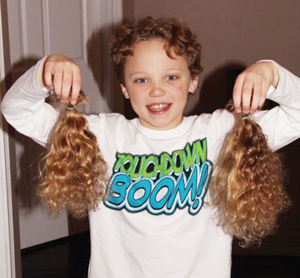 After growing his hair for two years, 10-year-old Eli Leukefeld had it cut so he could donate it towards a wig for a young person with cancer.