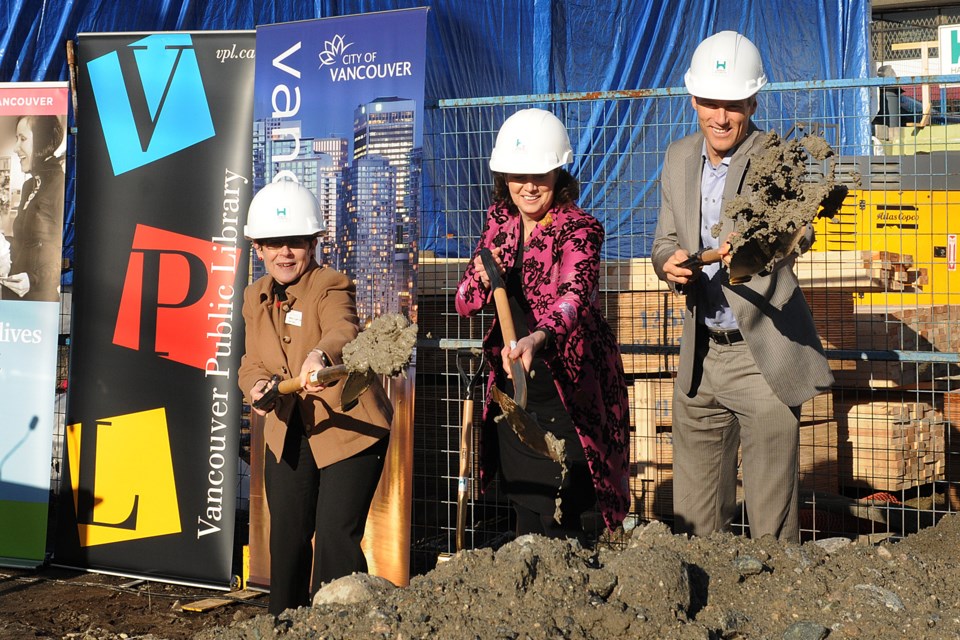 Vancouver Public Library board chair Mary Lynn Baum, YWCA Metro Vancouver CEO Janet Austin and Mayor Gregor Robertson took part in Monday’s ground breaking event for a $25-million library and social housing complex on East Hastings. Photo Dan Toulgoet