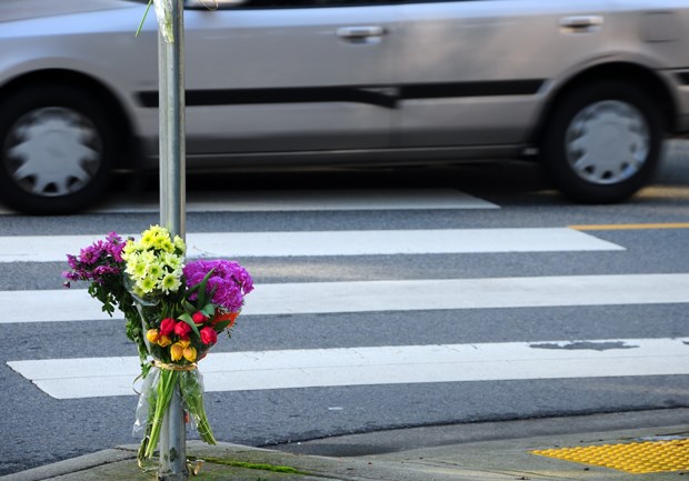 A makeshift memorial at the intersection where a West Vancouver senior was hit by a pickup truck on Jan. 15. The man died of his injuries on Sunday.