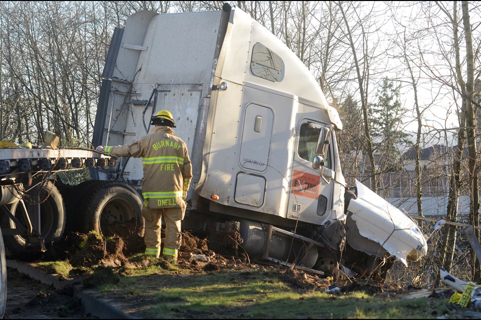 A tractor-trailer took out a light standard near Byrne Creek Secondary School Monday afternoon after sunlight got in the driver's eyes.