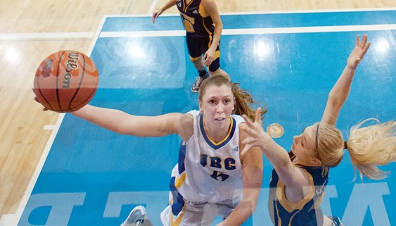 Kris Young soars to the hoop for the UBC Thunderbirds. Young helped convince her old friend Diana Lee to join her at UBC for one final run at a CIS national title.