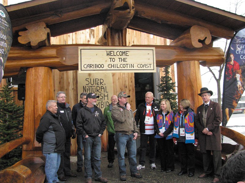 Dignitaries and HGTV Canada's Timber Kings open the Cariboo Chilcotin Coast Display that forms part of the 2015 Canada Winter Games' Northern BC Tourism Plaza. Pictured here; from left: Chief Dominic Frederick of the Lheidli T'enneh First Nation; Prince George mayor Lyn Hall; Mike Morris; the Liberal MLA for Prince George Mackenzie; Andre Chevigny of Williams Lakes' Pioneer Log Homes; Art Kaehn; the chair of Fraser Fort George Regional District; Peter Arnold of Pioneer Log Homes; Dick Harris; Conservative MP for Prince George-Bulkley Valley; Coralee Oakes; B.C. Minister of Sport and Liberal MLA for Cariboo North; Shirley Bond; B.C. Minister of Tourism and Liberal MLA for Prince George-Valemount; Al Richmond; chair of the Cariboo Regional District.
