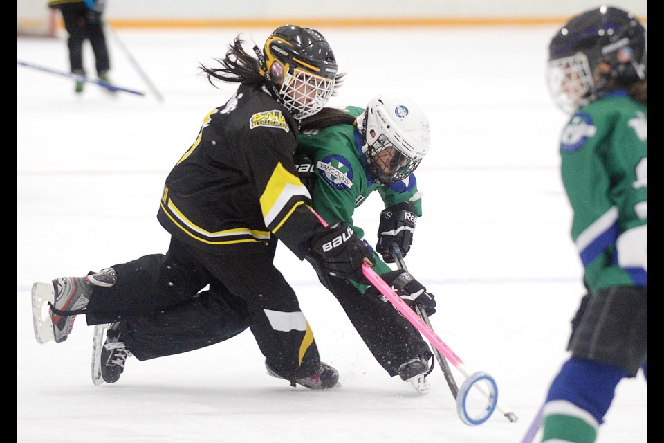 02-14-15
Burnaby/New Westminster vs Vancouver under 12 lower mainland ringette at Burnaby Lake Arena.
Photo: Jennifer Gauthier