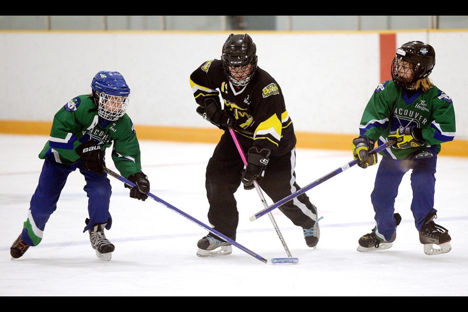 02-14-15
Burnaby/New Westminster vs Vancouver under 12 lower mainland ringette at Burnaby Lake Arena.
Photo: Jennifer Gauthier