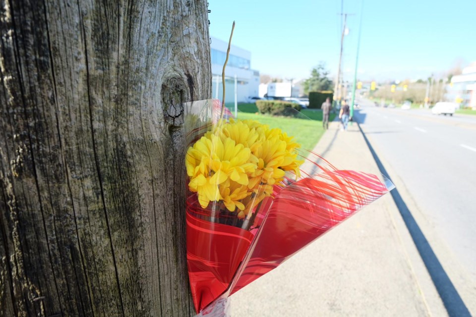 Flowers have been left in memory of a 22-year-old woman who died on Feb. 17 after she was hit by a car at Canada Way and Gardner Court.