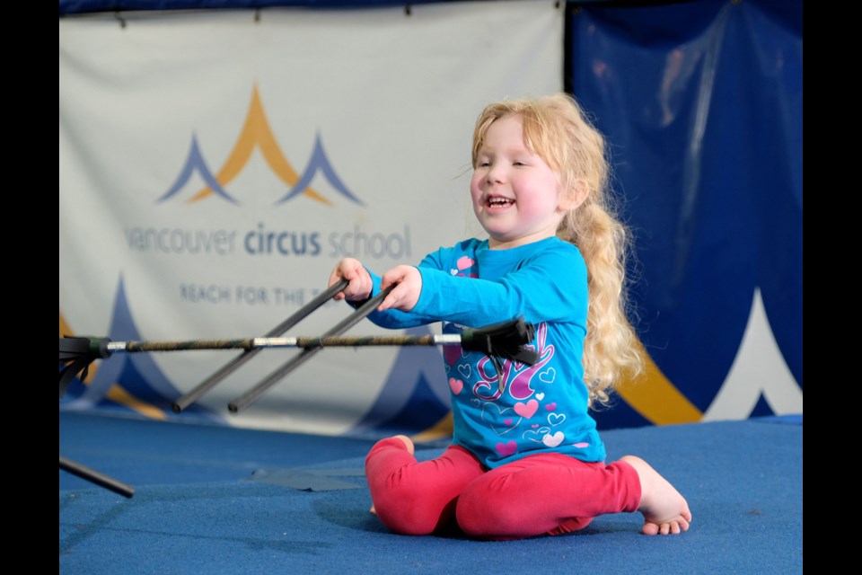 Milla Kurylo, 4, is having a ball at the Vancouver Circus School's parent and tot drop-in.