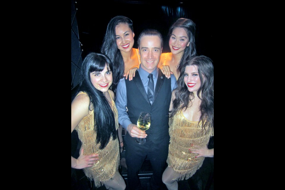 From left, Calida Kuzek, Keilani Elizabeth Rose, Dianne Doan and Christina Schell — The Darlings Cabaret — circled Brad Stanton, lead barkeep at newly opened Prohibition bar + lounge, Hotel Georgia’s throwback to the Roaring ’20s.