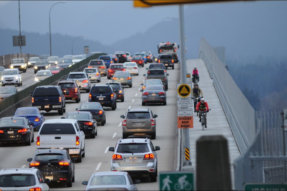 The east sidewalk of the Second Narrows Crossing is used by cyclists and pedestrians. In early February 2015, it re-opened after a 14-month-long renovation. Photo Dan Toulgoet