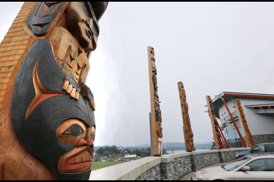 The house poles at the Songhees Wellness Centre were a collaboration between Butch Dick, Bradley Dick, Clarence Dick, Fabian Quocksister, Mike Charlie Jr., Tom Lafortune and Clark Gilahad. They tell stories about the area, warning, for example, of a dangerous area to swim.