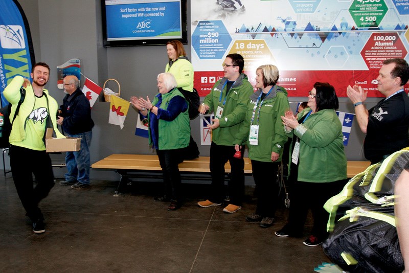 Canada Winter Games volunteers, airport staff and Manitoba communications staff clap and cheer Team Toba athletes and coaches as they arrive at Prince George airport Saturday afternoon for the second week of CWG competition. Volunteers have been greeting and sending off all the sports teams at the terminal in enthusiastic Prince George style.