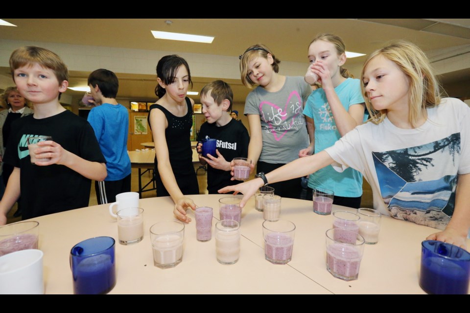 Students grab a nutritious smoothie prior to starting the school day.