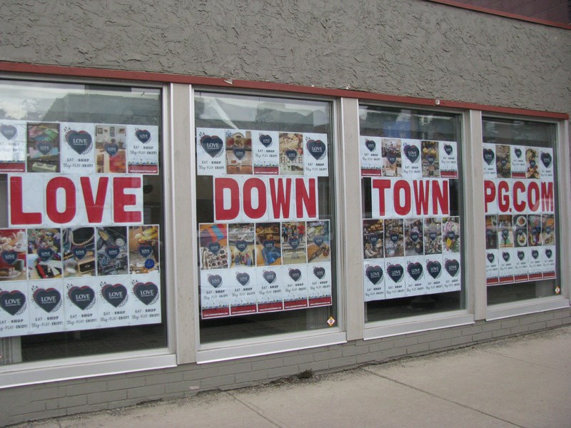 This storefront window on George Street was decorated by the Downtown Business Improvement Association and pretty much says it all.