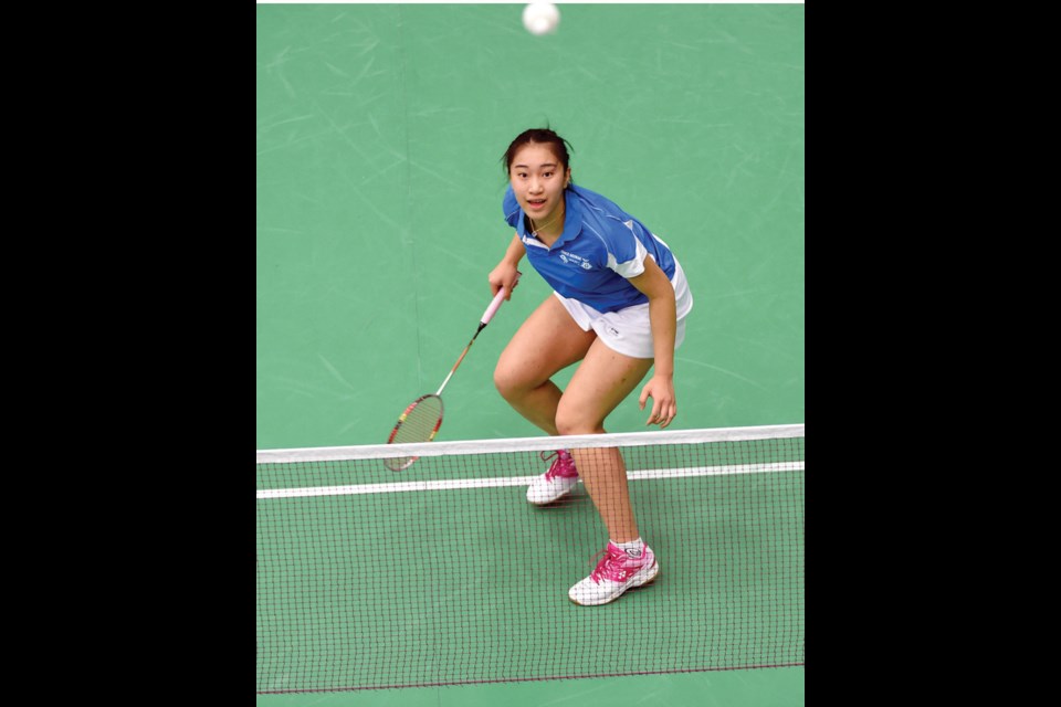 Badminton player Qingzi Ouyang of Team B.C. prepares to hit a shot during a women's singles playoff game at the Northern Sport Centre on Tuesday. Ouyang defeated Monica Cowper of Alberta in a quarterfinal match but then lost to Brittney Tam of Ontario in the semis. The medal games are scheduled for 9 a.m. Wednesday. Ouyang will face Alberta's Kyleigh O'Donoghue for bronze, while Tam will take on fellow Ontarian Rachel Honderich for gold.