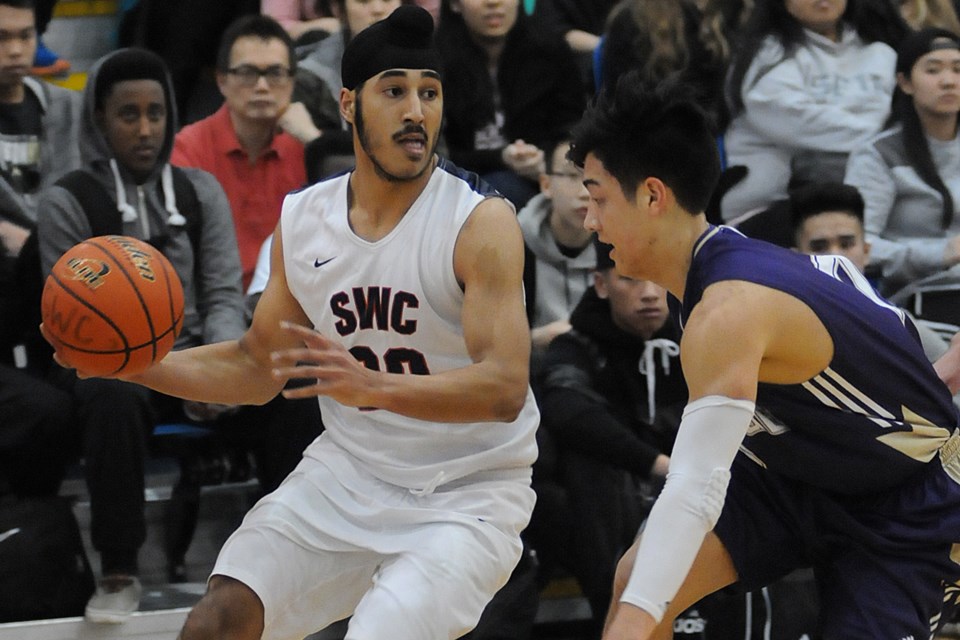 Churchill Bulldog Gary Minhas (No. 30) looks to make a play in a 103-90 semi-final win over Vancouver College in the senior boys AAAA Lower Mainland tournament at the Richmond Olympic Oval on Feb. 25, 2015. Photo Dan Toulgoet
