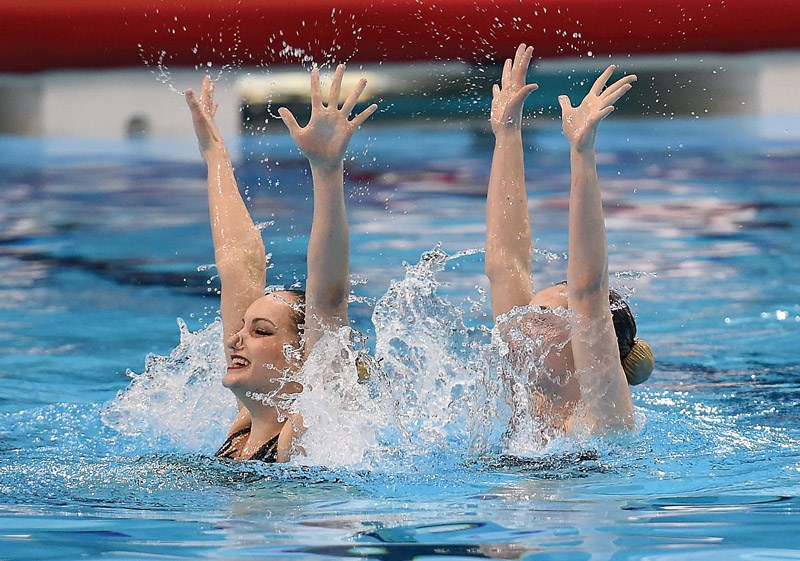 Team of Megan McGuigan and Josee Thomas from New Brunswick compete in the synchronized swimming pairs event at the Aquatic Centre during the Canada Winter Games.