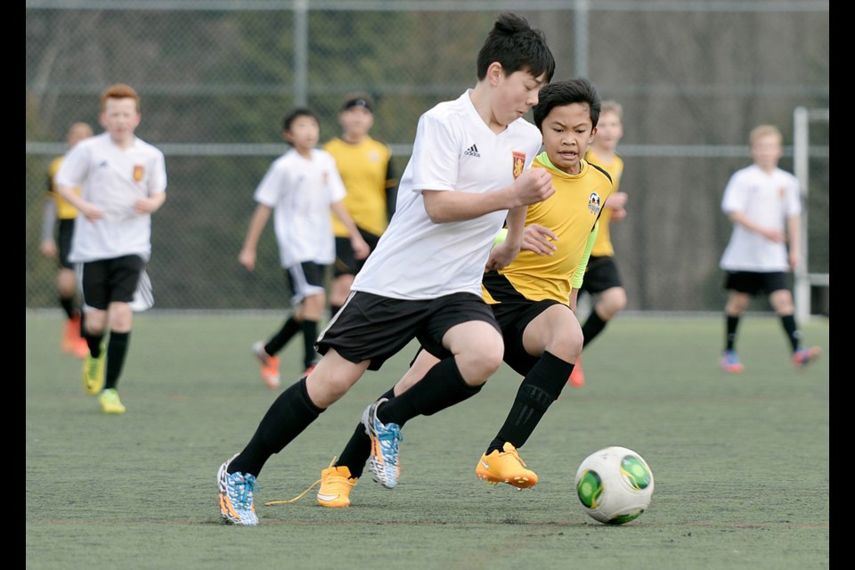 03-01-15
Wesburn Galaxy vs Kensignton-Little Mountain Surge in under-13 Gold 2 4District Permier Cup soccer final.
Photo: Jennifer Gauthier