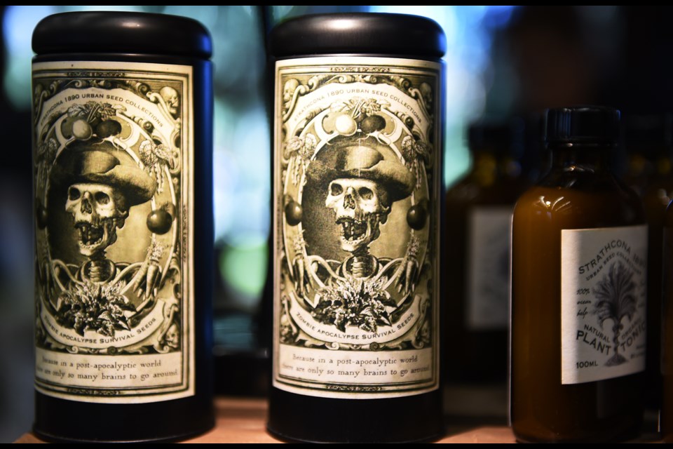 The roots of Judy Kenzie’s previous career in advertising was apparent in her labels with black-and-white skeleton in a cowboy hat for her “Zombie Apocalypse Survival Seeds” tins. Kenzie runs Strathcona 1890 Urban Seed Collections. Photograph by: Rebecca Blissett
