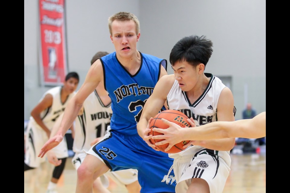 West Point Grey Academy’s Spencer Kwok powers forward in a 51-37 win over Northside Christian in the first round of the senior boys single-A B.C. basketball championship in Langley on March 13, 2015. Photo Ron Hole