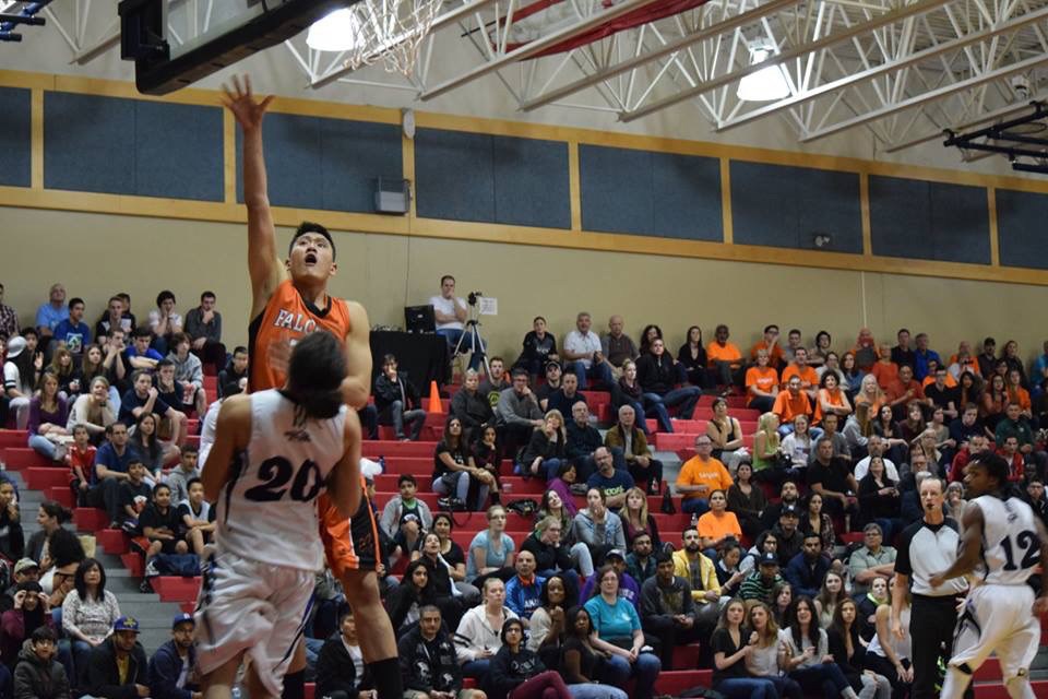 Falcon Garrett Ling-Lee goes hard to the hoop in a 82-76 loss to the Vancouver Island University Mariners in the PacWest men's basketball championship in Abbotsford March 7, 2015. Photo Emily Rowlandson