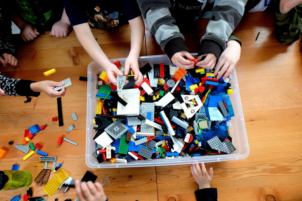 Kids get their hands on Lego at a Bricks 4 Kidz camp held during spring break at River Market.