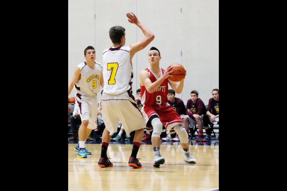 STM vs Wellington in opening day action at BC high school quad A boys basketball