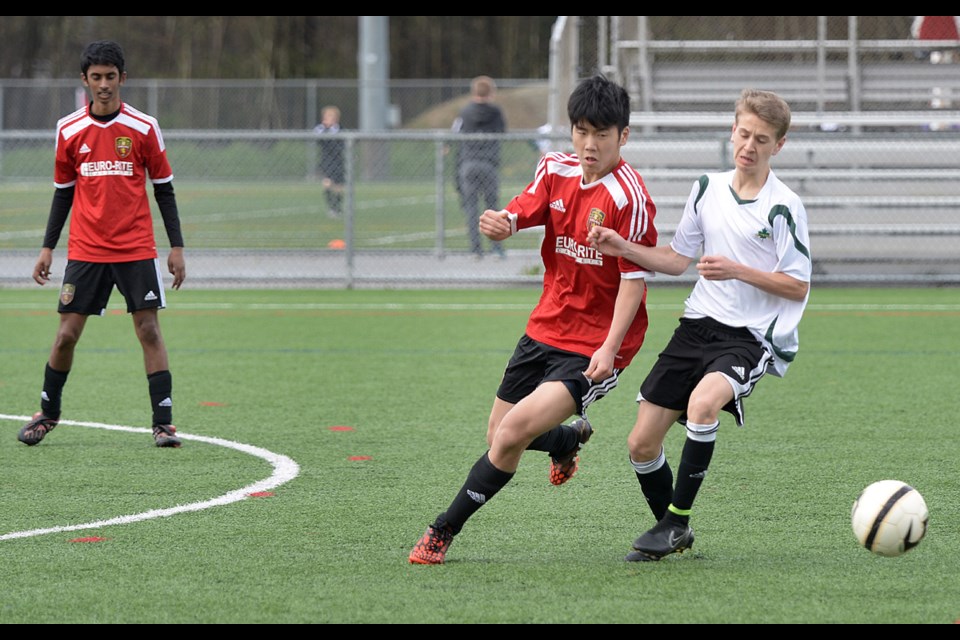 03-21-15
Burnaby vs Port Coquitlam at the South Burnaby Metro Club spring soccer tournament
Photo: Jennifer Gauthier