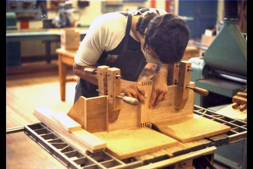 A Burnaby North student in John Clarke's woodworking class works on a project in the 1980s.