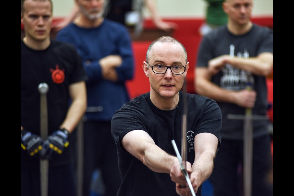 Guy Windsor, a swordplay instructor from Helsinki, Finland, demonstrates the medieval longsword Saturday morning during the Vancouver International Swordplay Symposium held at the Vancouver Masonic Centre. The symposium ran Thursday through Sunday and was hosted by local school Academie Duello. Photograph by: Rebecca Blissett