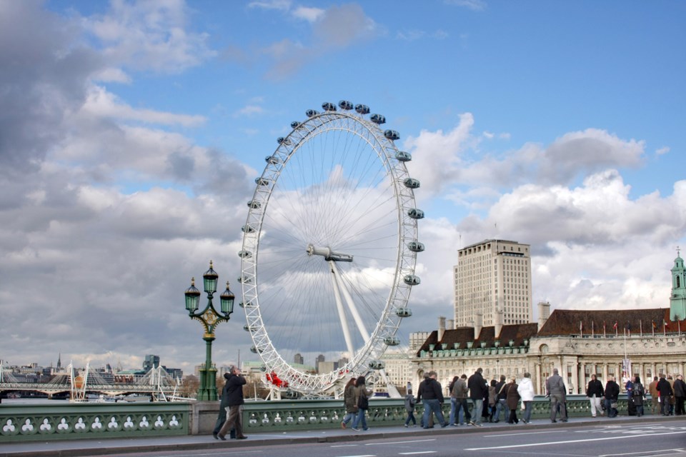 THE LONDON EYE: At 443 feet high the ride dominates the landscape on the River Thames. New Westminster is gearing up to welcome a replica of the wheel to the local waterfront.