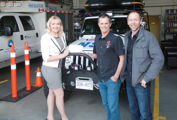 Representatives from Ryders Eyewear make a donation to North Shore Rescue. The eyewear company recently held a sample sale, offering discounts on old-model sunglasses and goggles, and raised more than $5,300, which it decided to donate to North Shore Rescue, Squamish Search and Rescue and the North Shore Mountain Bike Association.