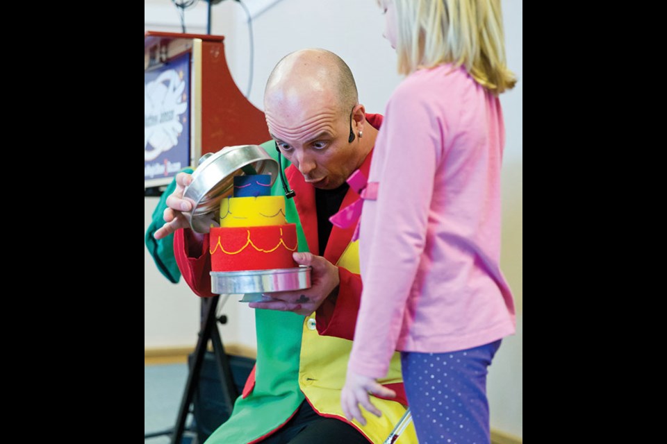 Youngsters were all smiles when Matthew Johnson brought his interactive show to local libraries over Spring Break. The blend of magic, juggling, comedy and music delighted kids at the Tsawwassen and Ladner Pioneer branches.
