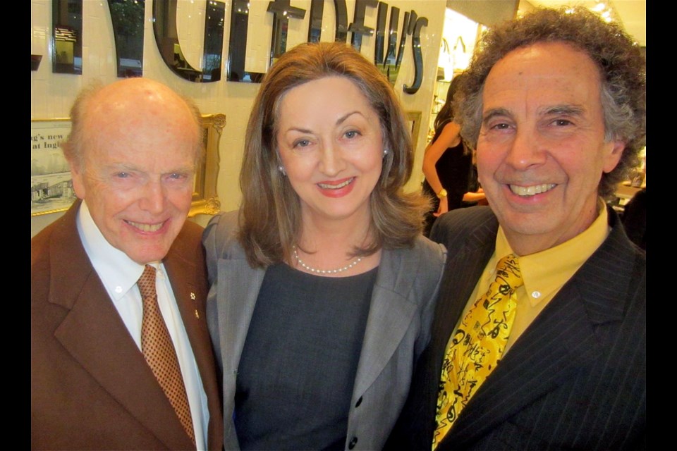 Third generation CEO Bill Ingledew, right, and store manager Ilena Warczak welcomed billionaire Jimmy Pattison to the company’s centennial celebrations at its flagship store on West Hastings.