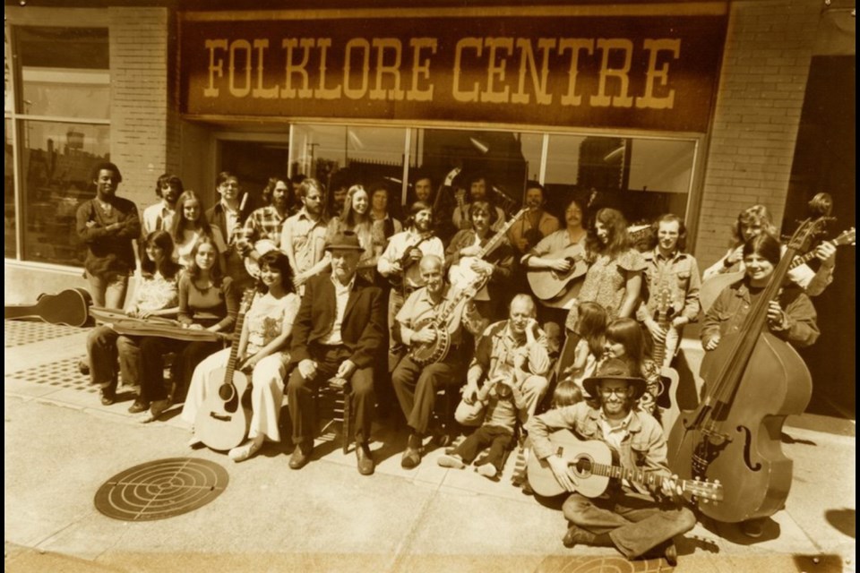 Originally, the club went by the name The Victoria Folklore Society, but within the year had changed to the Victoria Folk Music Society to avoid confusion with The Folklore Centre, the music business (pictured in the photo) run by Dave and Marjorie Cahill).