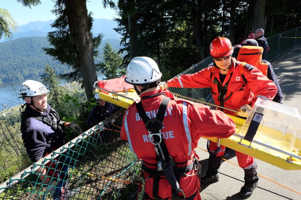 Burnaby firefighters were practising their technical rescue skills on Burnaby Mountain Thursday. Crews practised carrying stretchers and equipment down the side of the steep cliff to an awaiting "patient."