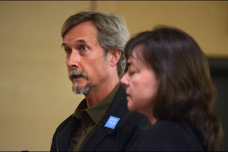 Burnaby parents Peter and Charlene Cech address trustees and staff at a public school district budget meeting at Burnaby Central Secondary Thursday.