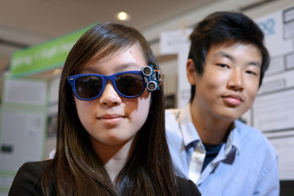 Venessa Chan and Sun Chang created a $25 clip-on sensing device that will help the visually impaired navigate more effectively. Photo: Jennifer Gauthier