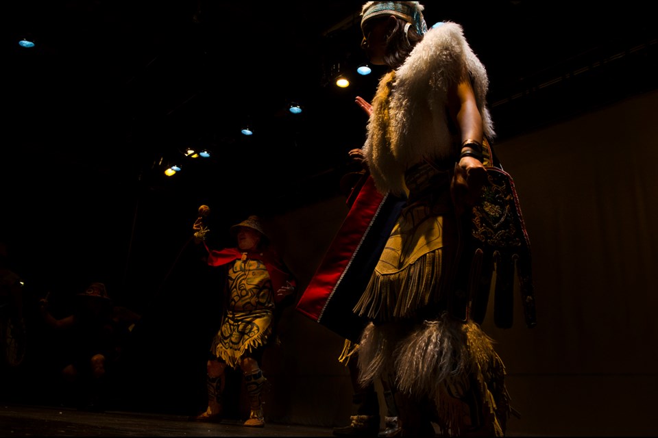 The Git Hayetsk dance group performs at Burnaby North Secondary in the wrap-up assembly for a daylong event to raise awareness about residential schools Monday.