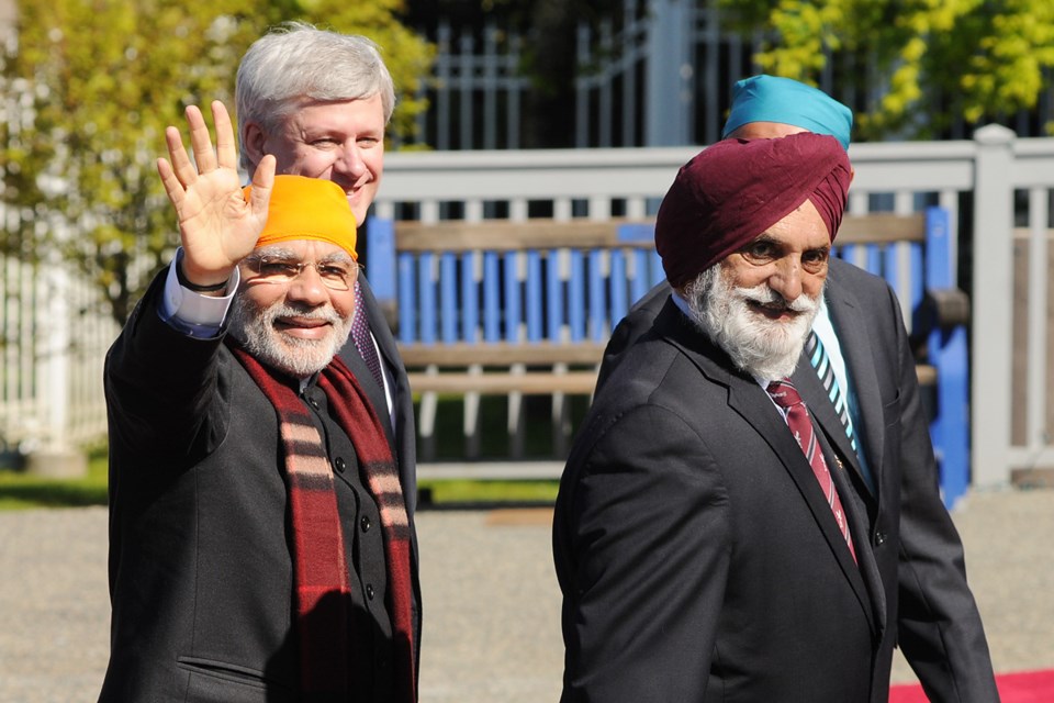 Indian prime minister Narendra Modi joined Prime Minister Stephen Harper in a visit to Vancouver’s Ross Street Temple Thursday afternoon. Protesters were kept away from the event by Vancouver police. Photo Dan Toulgoet