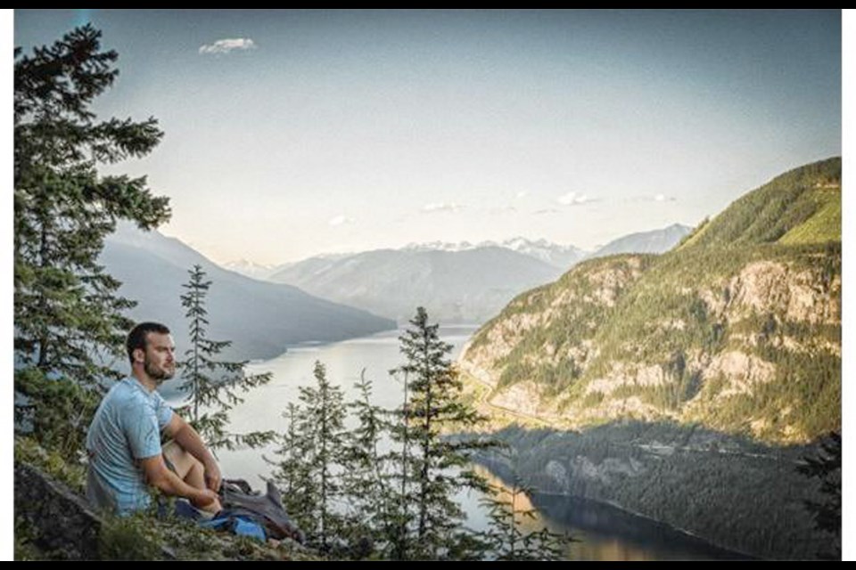 A hike takes visitors to a spectacular view of Slocan Lake. On the right, the highway that connects New Denver and Slocan winds above Slocan Bluffs, a playground for rock climbers.