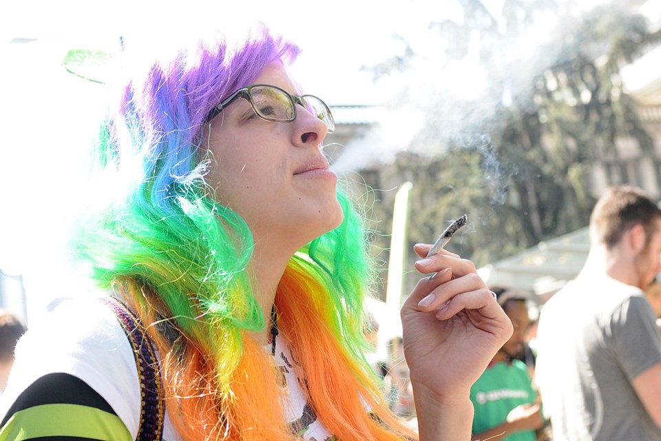Thousands gathered outside the Vancouver Art Gallery Monday afternoon to mark 420 — the annual marijuana smoke-in. Photo Dan Toulgoet