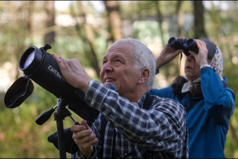 George Clulow leads a nature walk through Burnaby's Deer Lake Park on April 17.